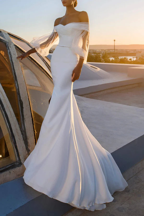 Act Fast Unique off shoulder long sleeved fishtail wedding dress