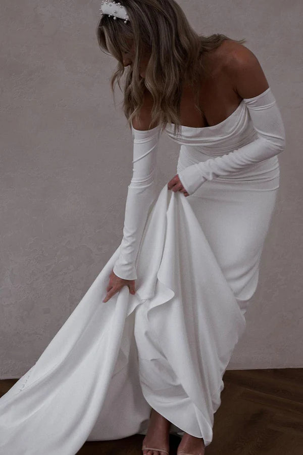 Online Exclusive Unique off the shoulder long sleeved Bohemian style satin wedding dress paired with court train Online Exclusive Unique off the shoulder long sleeved Bohemian style satin wedding dress paired with court train